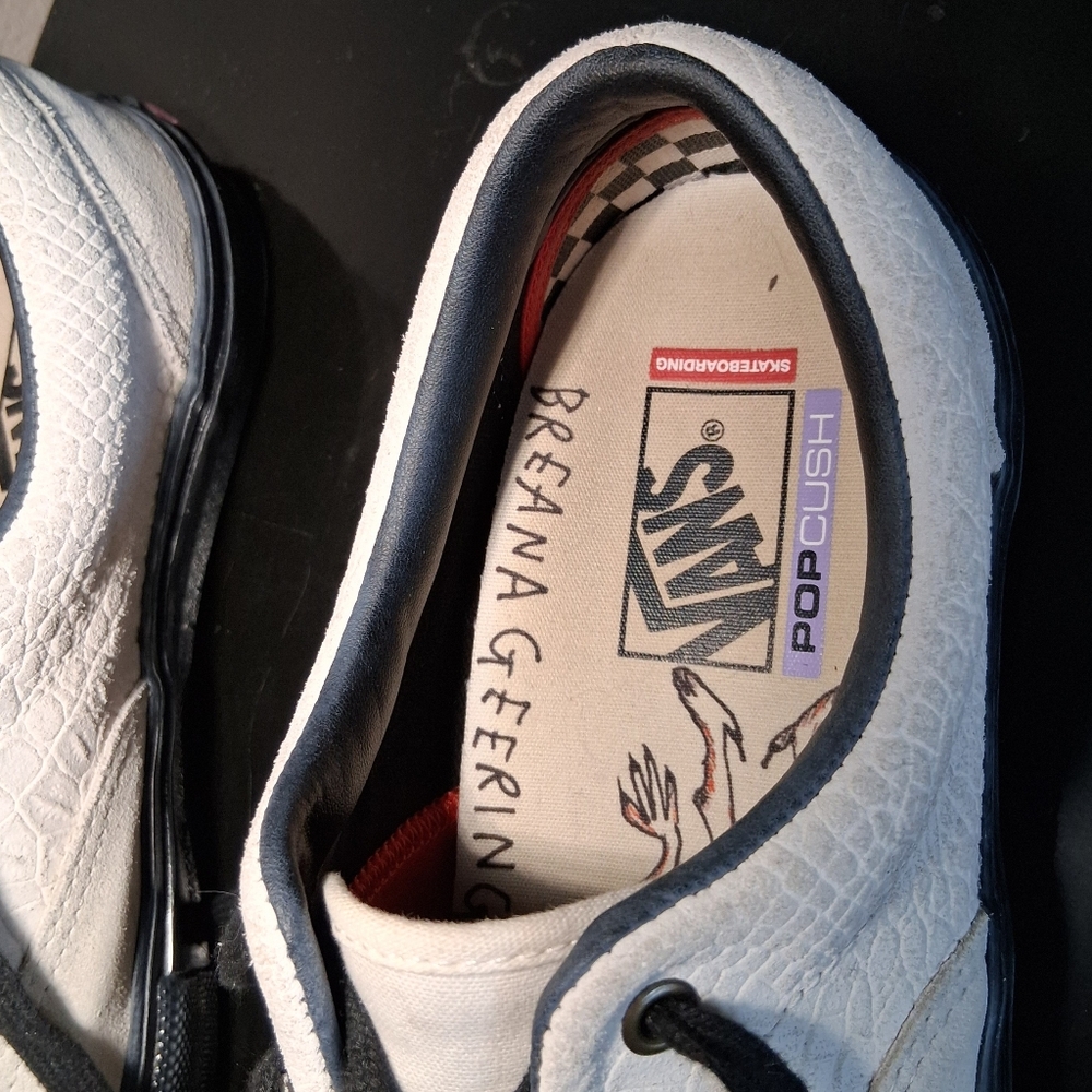 Vans Black and White Classic Sneakers with Iconic Logo